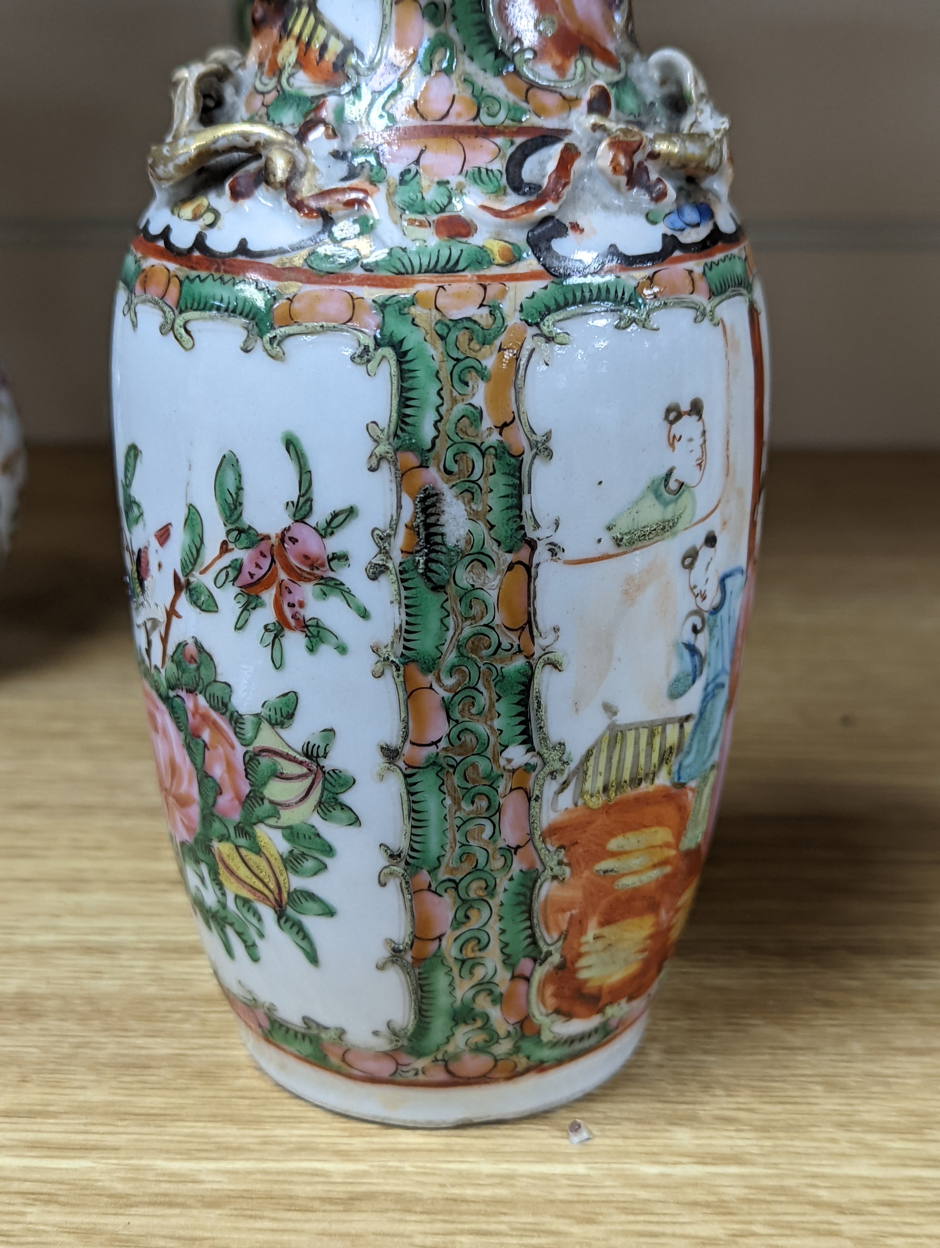 Four 19th century Chinese famille rose vases, 21cm